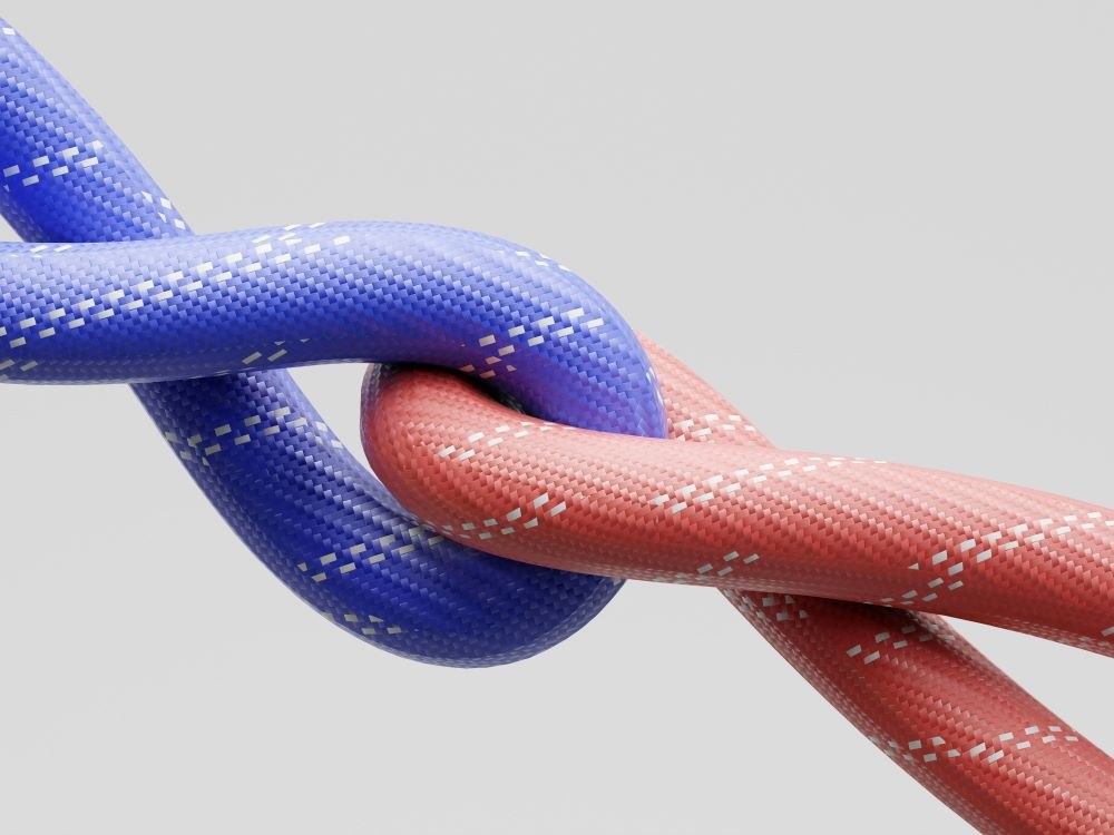 Deux cordages noués — l'union de nos forces